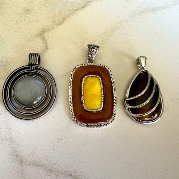 3 Lia Sophia Pendants like new.
